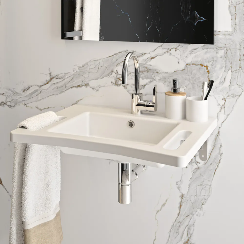 An accessible wall-hung basin with integrated handholds