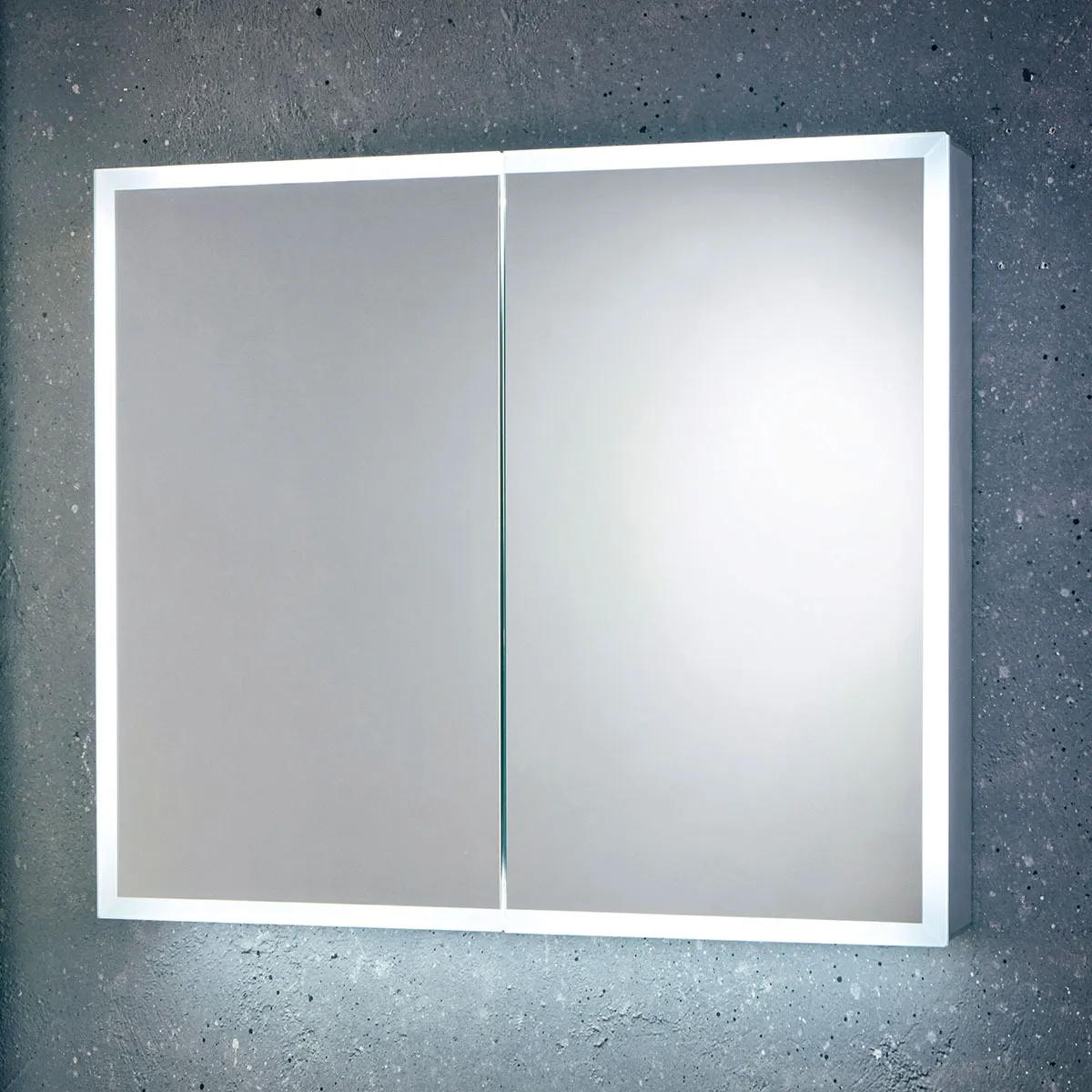 An illuminated bathroom mirror cabinet